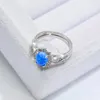 Klusterringar explosiv blå opal set ring s925 sterling silver diamant mode ljus lyx enkel kvinnors kostym