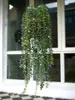 装飾的な花110cm人工緑の植物壁を吊るしたプラスチックのつるの結婚式のシーンアーチ装飾用品屋外庭のアイビーフェイク