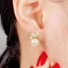 Orecchini a bottone MKOPSZ coreano lusso zircone fiocco imitazione perla ciondola per le donne accessori gioielli orecchino colore oro moda