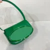 Designer godisfärgad patentläder axelväska med ny och unik teknik modern stadsstil kvinnors väska