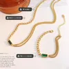 Серьги ожерелья устанавливают европейские и американские интенсивные модные цирконы двойной цепь, сложенные женские украшения, украшенные золотыми украшениями
