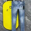 Дизайнерские джинсы мужские брюки модная главная улица мужские синие писем на печатном виде эластичные брюки на мотоцикле