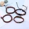 Braccialetti con ciondoli 4 pezzi/set Vintage Boho Punk cavo in pelle marrone scuro avvolgere perline perline in legno strati braccialetti gioielli Unisex