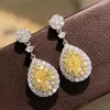 Dangle Earrings Caoshi تصميم رائع للنساء ملحقات CZ صفراء التسلسلات الدموية التجمي