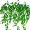 الزهور الزخرفية النباتات الاصطناعية الكروم الأخضر الأوكالبتوس أوراق جارلاند فورت نبات ديي جدار شنقا المنزل حفل زفاف في الهواء الطلق
