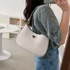 Designer de luxe femmes sac à bandoulière couleur unie sac à main à la mode matériau pu à la mode et polyvalent grande capacité boucle magnétique sous les bras croissant sacs