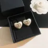 Luxe Designer Mode Hartvormige Knoop oorbellen Witte hars acryl 925 Zilveren naald oorbel voor vrouwen party verjaardagscadeau sieraden hoge kwaliteit met doos