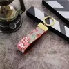 Клавиатуры ручной работы роскошные дизайнерские дизайнерские корректы Lanyards Mens Mens Metal Buckle Cheate Care Car Key Chaue Bag Sagm Unisex Keyring Классический модные аксессуары PQ PQ