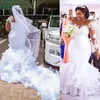 2022 Vintage Mermaid Wedding Dresses Jewel Neck Illusion Lace Applicques Long Sleeves Organza Ruffles Tiered Plus Size Chapel Train257q