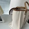 Luxurys kanalpåse designer väskor handväska strandpåse på mode textur stor kapacitet bärbara shoppingväskor axel multifunktionell bärbar crossbody väska