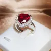 Klaster Pierścienie 925 Srebrne romantyczne miłosne serce dla kobiet Oszałamiająca czerwona sześcienna cyrkonia Pierścień Weding Luksusowy biały złoto Kolor Obiec