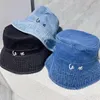 Sombrero de cubo de diseñador caliente Cuerda Gorra plana Gorras ajustables Sombreros de cubo de ala ancha Sombrero de vaquero de moda Sombrero de playa de verano con letras para hombres, mujeres