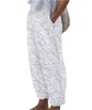 Pantalon féminin vintage mujer femme blanc broderie printemps été décontracté chic tunique élastique de taille en dentelle pantalon