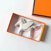 Portachiavi Cordini Swift Pelle di pecora Borsa per cavallo Fascino Lusso Portachiavi Paddock Vera pelle Nano Pegaso Ciondolo Ala Volante Ornamento1172WNXYQ5