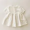 La ragazza veste i vestiti del bambino in vestito estivo bianco Smocked Kids Little Girls Handmade Toddler Princess Vintage Smock