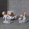 Objetos decorativos Figuras Astronauta Forma Soporte para teléfono Astronauta Decoración de oficina Soporte de decoración Lindo Soporte para teléfono inteligente Adornos pequeños Regalo de artesanía 230625