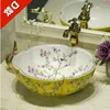 Forme de fleur Chine Artistique Lavabo en céramique à la main Lavabo en céramique Comptoir Lavabo Lavabos de salle de bains Éviers européens qté Exjkq