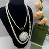 2023 Nouveau collier de perles Gujia G en laiton conçu par une chaîne de chandail à double couche de niche