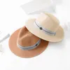 Szerokie brzegowe czapki 2022 Nowy lato Panama Hat for Women Black Ribbon Hat Fashion Lady Church Caps Beach Sun Cap Ochrona UV Fedora Hatsun Block HKD230625