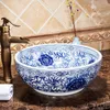 Lavabo en porcelaine de comptoir Lavabos de salle de bains Lavabo en céramique lavabo bleu et blanc Rjpcs