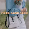 Sacs de créateurs pour femmes Wang Ziwen's Même sac Longxiang français Seau en toile Section en bambou Portable Une épaule Cross Body Ventes directes d'usine pour femmes