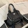 Bolso de diseñador Cena P Hombro familiar Tela de paracaídas para hombres Tres en uno Niño Madre Ocio Mensajero Nylon 1BH046