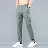 メンズパンツ2023夏のメンズルーズストレートストレートシンカジュアル韓国ドローストリングアイスシルク通気性ジップポケットズボン男性