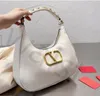 Diseñadores de cuero bolso de axila bolso crossbody monedero carteras de alta capacidad solapa pañal mochila letras impresas mujeres bolsos 308k