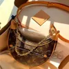 Сумка роскошной петли Croissant Crossbody Металлическая цепная сумка на плече бродяга дизайнер кошелек M81098 Косметическая полумесячная багет