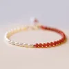 Bracelet en perles d'agate rouge du sud naturelle, petites perles de riz de 2mm, élastiques, bijoux à la mode pour femmes