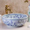 Livraison gratuite Jingdezhen peinture à la main artisanat bleu et blanc en céramique salle de bain lavabo lavabos haute qualité Xrqdq