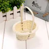 Nuovo cesto di fiori in vimini fatto a mano Maniglia portatile Festa di nozze Picnic Cesto decorativo fai-da-te Regalo per bambini Pasqua Vimini Stoccaggio in rattan