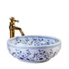 Rose blau weiß Keramik Art Basin Waschbecken Europa Vintage Stil Aufsatzwaschbecken Badezimmer Waschbecken Eitelkeiten Porzellan Waschbecken Handwaschbecken Arabq