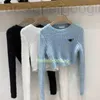 Женские свитера дизайнер 22ss Woman Turtlenck Женский свитер Короткие стильные толстовки для леди Slim Hoodie Jumpers Вязаная рубашка Дизайнерская одежда EL3E