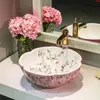 Blume und Vogel rosa Farbe Badezimmer Lavabo Keramik Aufsatzwaschbecken Garderobe Porzellangefäß Waschbecken Waschbecken Waschbecken gute Menge Tqfjt