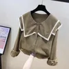 Blouses pour femmes Chemise de niche à col de poupée Sense de conception européenne pour femmes Automne et hiver Tempérament Réduisant l'âge Chic Chemisier étranger