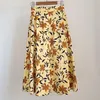 Faldas Falda de mujer de otoño temprano Estampado floral Cintura alta Algodón plisado A-line Midi Jupe