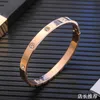 Designer Charm Online Hot Selling New Rose Gold Titanium Steel Armband Women's Simple Open 18K Small Design Par BH