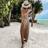 Kvinnors badkläder Kvinnors 2023 Bikini Cover-Ups White Crochet Tunika Sexig Se genom ärmlös mesh klänning kvinnor sommarkläder strand