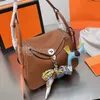 Designer Bag Tote Bag Shoulder Crossbody Bags Women Vintage Cowhide Leather Handbags Metal Hardware Twist Buckle Zipper Opening Closing Silk Scarf Pendant