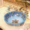 Konstnärlig porslin badrum fåfänga sjunkande skål bänkskiva blommor form keramisk tvättbassäng sjunker qty dixao