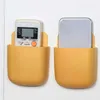 Ny väggmonterad lagringslåda mobiltelefon plugghållare stativ rack fjärrkontroll lagringsorganisatör fall för luftkonditionerings -tv