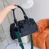 Przenośna torba podróżna 2023 NOWOŚĆ WOMENTAMI Projektant Torebka Moda na ramię Crossbody Cylinder Pillow Torby Duża pojemność D2306261S