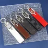 Keychains Designer Key Buckle New Fashion Handmased Brand Gold Silver Alloy Keychain Leather Key Buckle Key Rings with Box