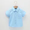 Familjsmatchande kläder högkvalitativa barnskjorta Kort ärmkläder Vanliga bomull Summer Lapel Boy Cardigan Shirts 230626