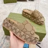 Designer Sandalen Slippers Zomer Heren Dames Schoenen Vormig Veelkleurig GG Flora Slides Gegoten voetbed in zwarte tonale rubberen zool met reliëf aan de buitenkant 2024