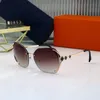 52% OFF Wholesale of sunglasses New Frameless Trimmed Box Women's Sunglasses Metal Glasses