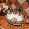 China Artística Procelain Hecho a mano Europa Vintage Lavabo Cerámica Lavabo Baño Sinkgood qty Wxxsk