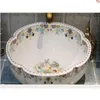 China Lavobo Cerâmica Artística Artesanal Redonda Bancada do banheiro lavatório pia porcelanagood qtd Ppblj