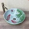 Lavabo de salle de bains personnalisé en porcelaine de Lotus sculpté à la main d'art chinois pour hôtel / Barhigh quatity Gxalg